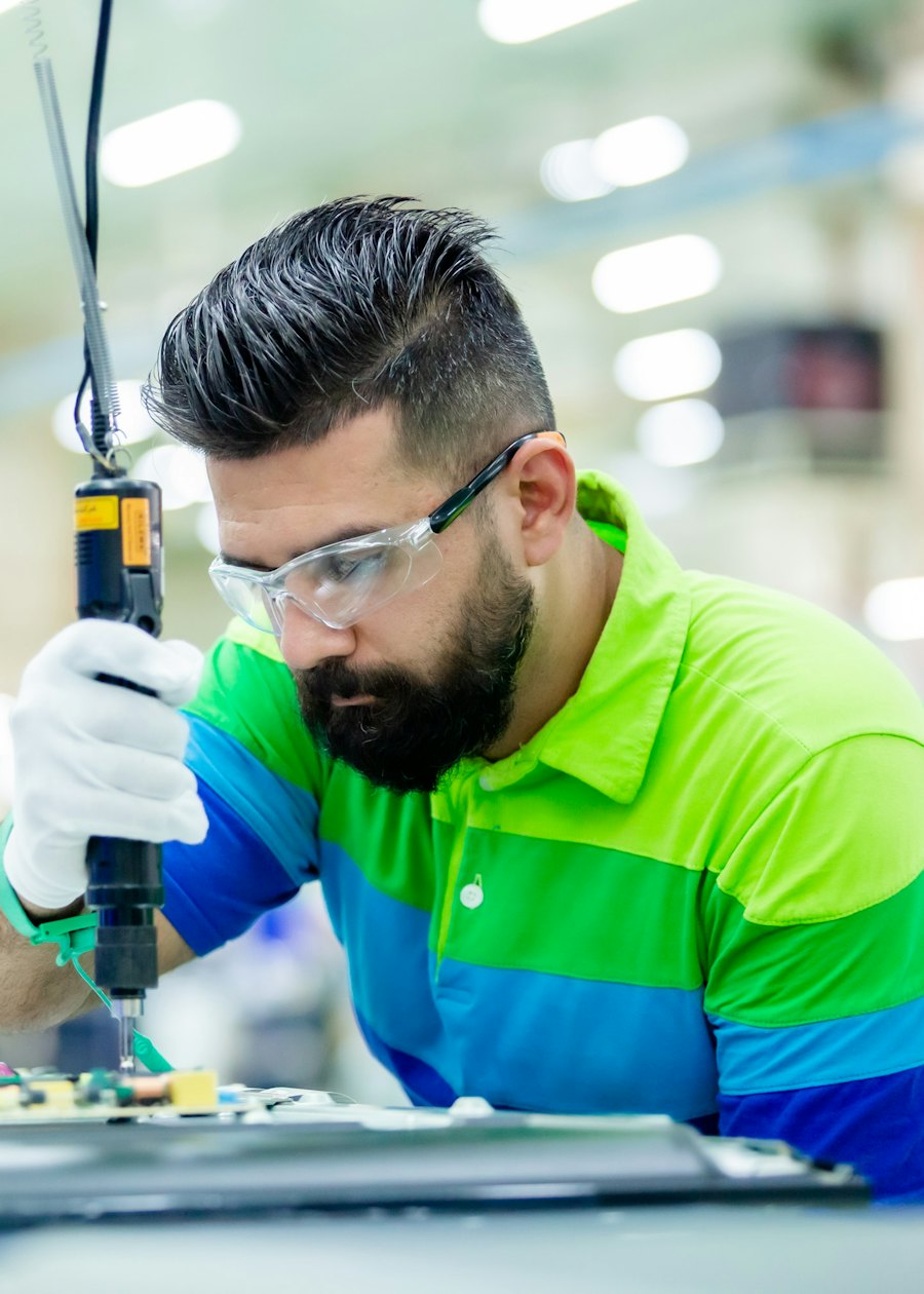 An engineer assembling electronics